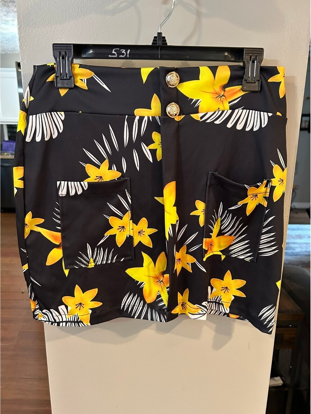Women's Black Mini Skirt with Yellow Floral Print and Front Pockets, Size M